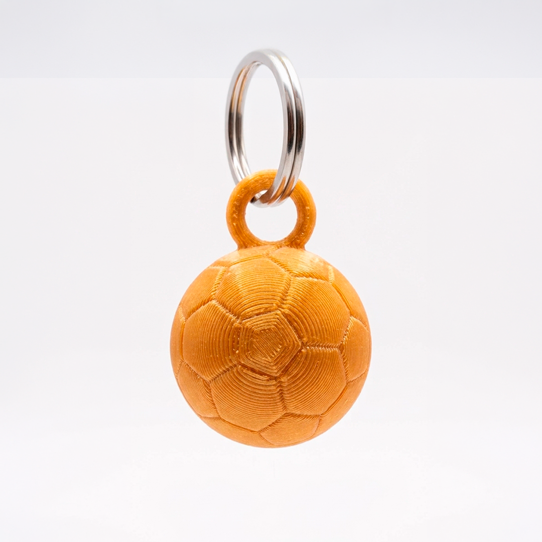 Holding balon de oro